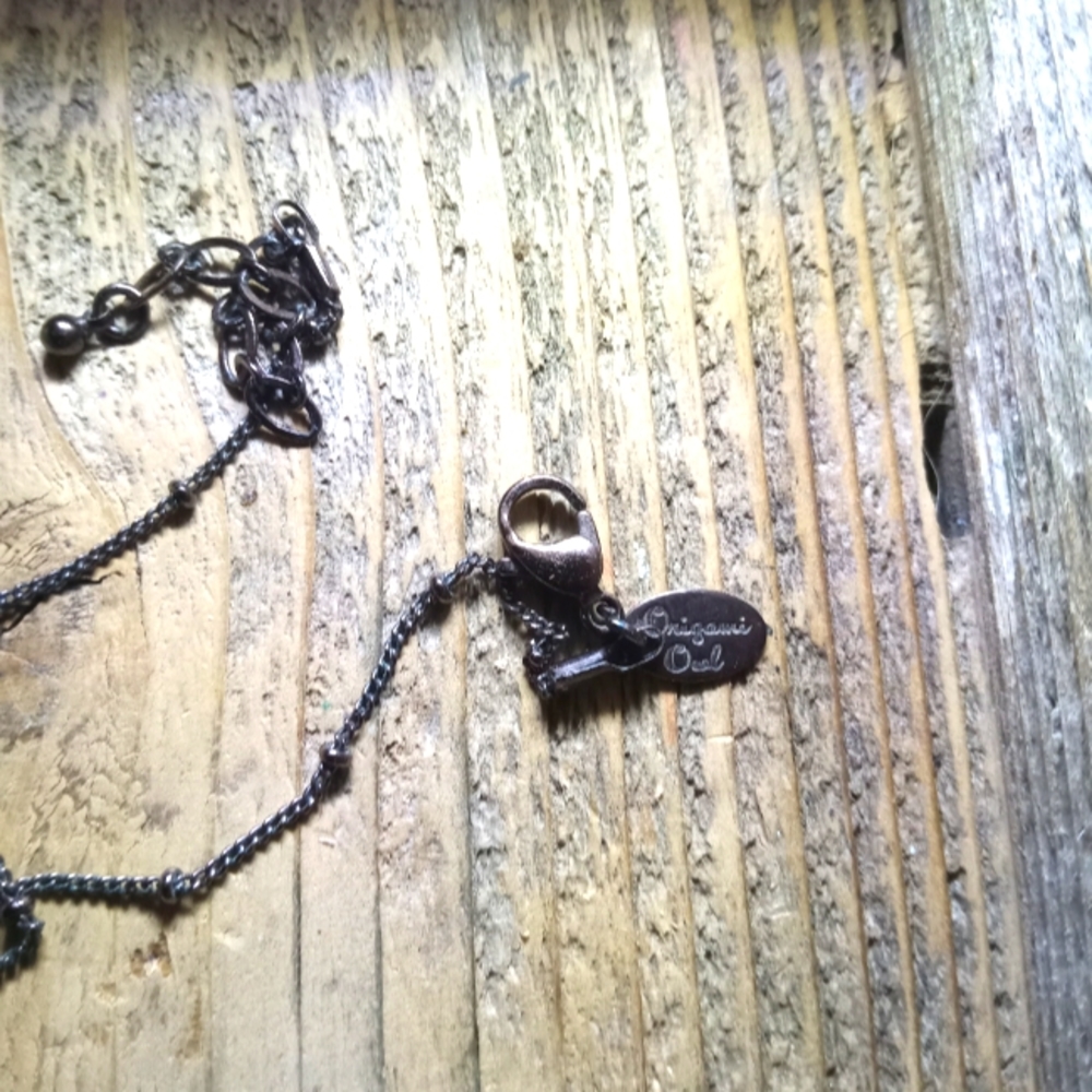 Shorter length. Dark origami owl necklace